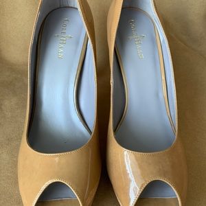 COLE HAAN peep toe platforms.